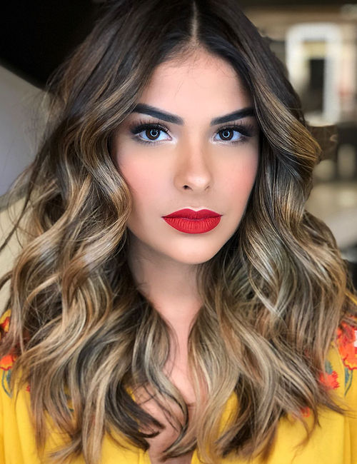 Hair styists in the UAE - natural to blonde highlights balayage