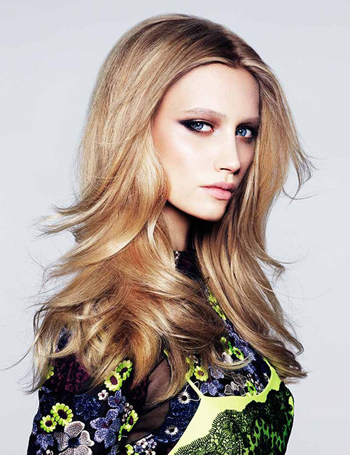 Toni & Guy haie salons in the UAE - long soft curls - blonde